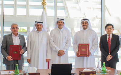 five men standing for finalization of agreement