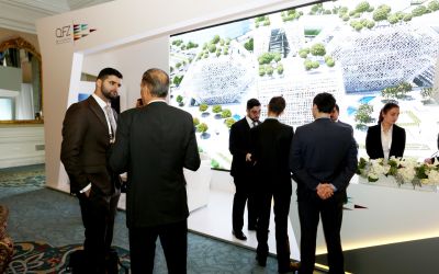 Qatar Free Zones Authority is participating in the 10th edition of the Bosphorus Men shown conversing at Summit week in Istanbul