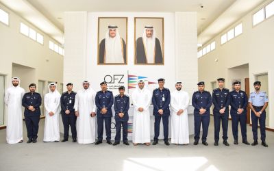 QFZ and General Directorate of Passports MOI senior leadership pose for group photo at Ras Bufontas Free Zone